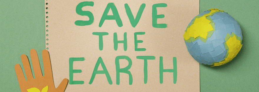 A handmade collage showing a sign that reads “SAVE THE EARTH” in green letters on brown paper. To the right is a paper globe, and to the left is a cut-out of a brown hand with a yellow plant sprout on the palm, all on a green background.